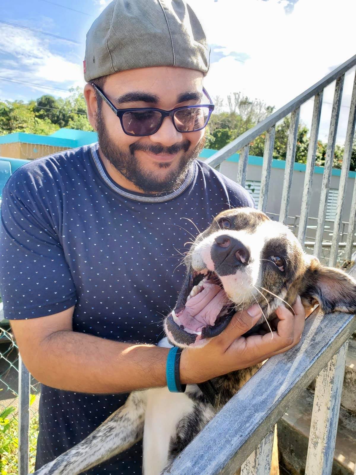 Team member Sam Ramos with his dog named Chewy